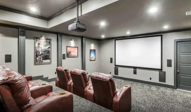 Inside a Lakefront Luxury Texas Dream Home 10 Movie theater room in Texas home