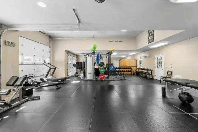 Inside the Home of L.A. Rams Wide Receiver Cooper Kupp 13 Home gym where football player Cooper Kupp stays in shape during the offseason.