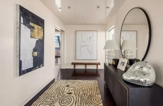 Inside the Toothsome Home of Entrepreneur and Shark Tank Star Robert Herjavec 4 Sleek hallway in Robert Herjavec’s Manhattan condo