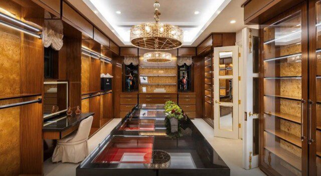 Michael Amini’s home has massive master closet with custom shelving 