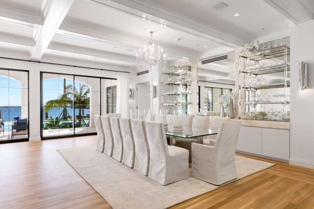 Elegant dining room in luxury waterfront estate of Michael Dorrell 