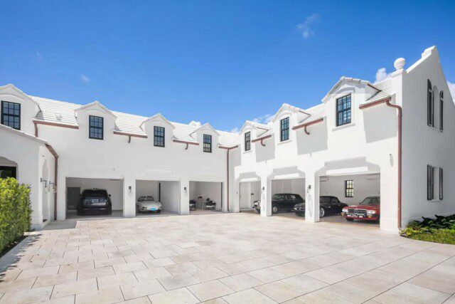 Multi-car garage at Michael Dorrell’s Palm Beach house for luxury vehicles 