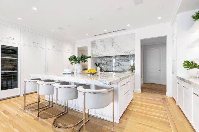 Designer kitchen in Michael Dorrell Palm Beach house with marble countertops 
