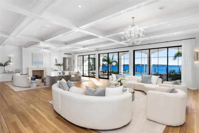 Interior of Tarpon Island house with hardwood floors and chandelier 