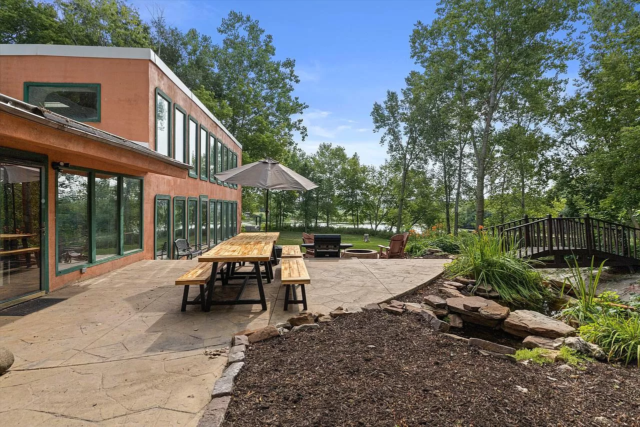 Relax and enjoy the outdoor “Bedrock” on this Flintstones mansion patio 