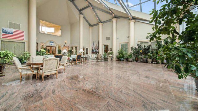 Another view of George Foreman’s sunroom, bringing natural beauty indoors. 