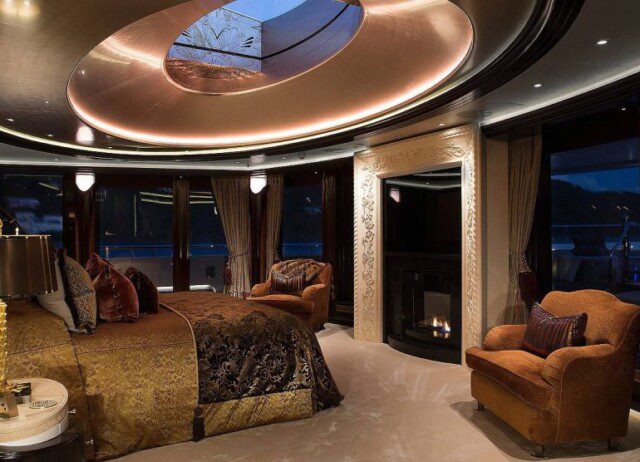 Lavishly decorated guest bedroom with ocean view onboard the Kismet