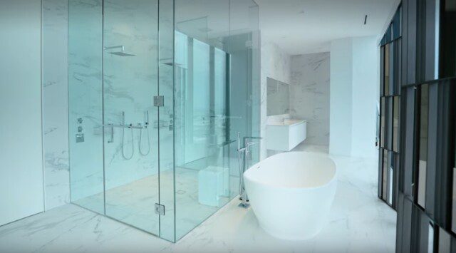 Luxury bathroom with soaking tub and modern design elements 