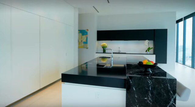 Spacious, clutter-free kitchen with sleek cabinetry in the Ridinger house 