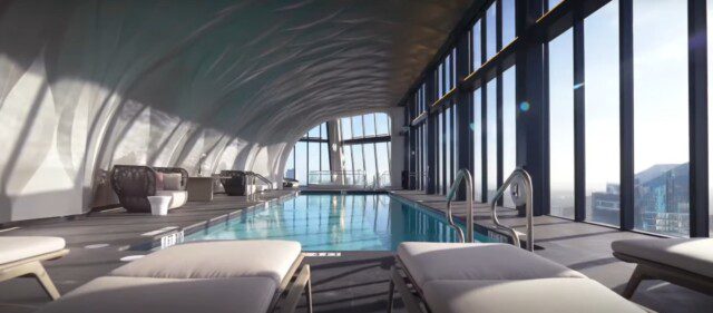 Indoor pool on upper level of One Thousand Museum with skyline views 