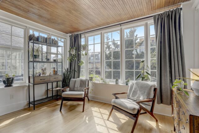 Seattle Craftsman living room - Warm wood ceiling, inviting windows