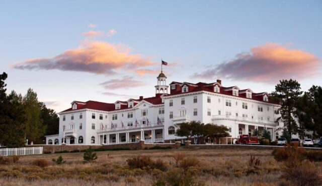 Front view of the Stanley Hotel, known for its haunting role in inspiring The Shining 