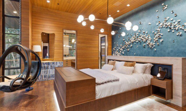 Elegant master bedroom with luxurious design in Russell Weiner’s Park City estate. 