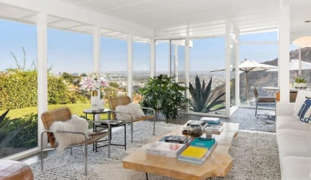 Protected glassed-in living area offering a serene atmosphere in Shaun White's home.