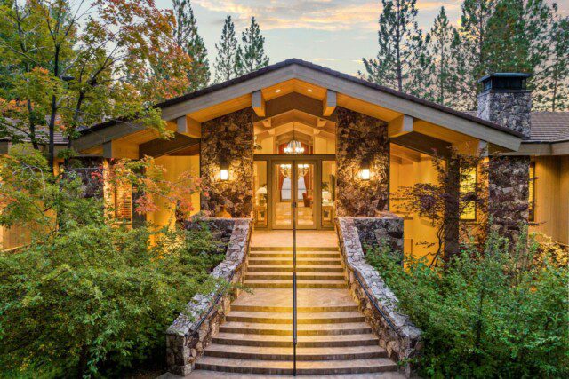 Exterior of Steve Wynn's Lake Tahoe estate, a luxurious property with a lakefront view.